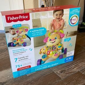 NEW IN BOX BABY WALKER